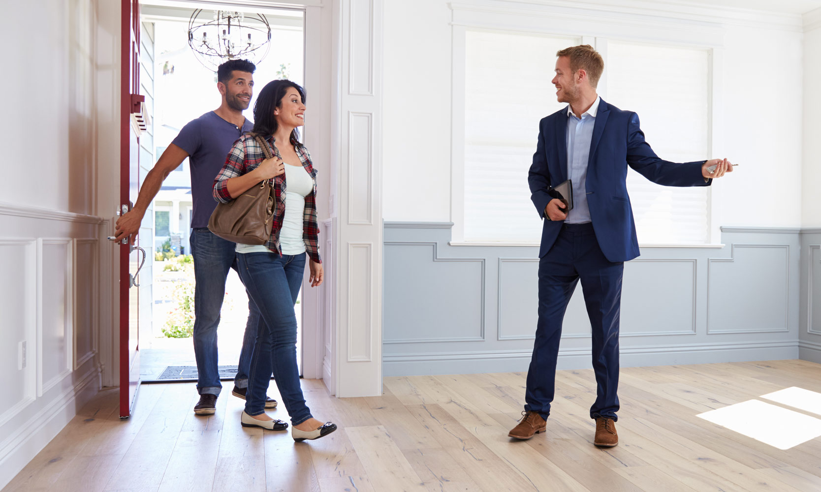 Realtor showing couple a home