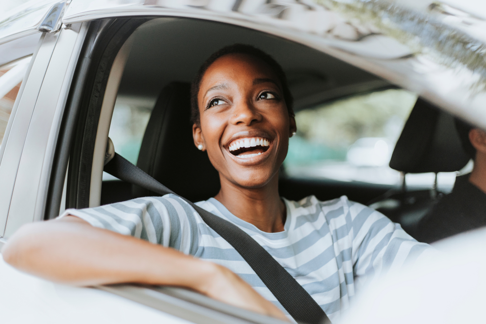 Cheerful Woman in a car